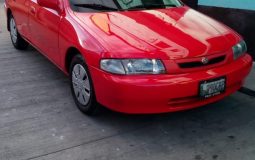 GANGA VENDO PRECIOSO MAZDA PROTEGE 1997, MECÁNICO, MOTOR 1500 CC, POLARIZADO, PINTURA DE LUJO COLOR ROJO FERRARI, LUCES XENON CON BALASTROS NUEVOS, SILVINES NUEVOS, SERVICIOS DE ACEITE Y PASTILLAS RECIENTE, VIDRIOS Y RETROVISORES ELECTRICOS, LLANTAS NUEVAS, RADIO SONY USB, PINTURA DE MOTOR, LLANTAS NUEVAS CONTINENTAL, IMPUESTO 2018 YA PAGADO.