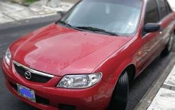 Mazda 323 2002 color rojo, de agencia, motor 1300, un solo dueño. El carro es 323, lo coloque en 3 porque no me aparece la opcion de 323.